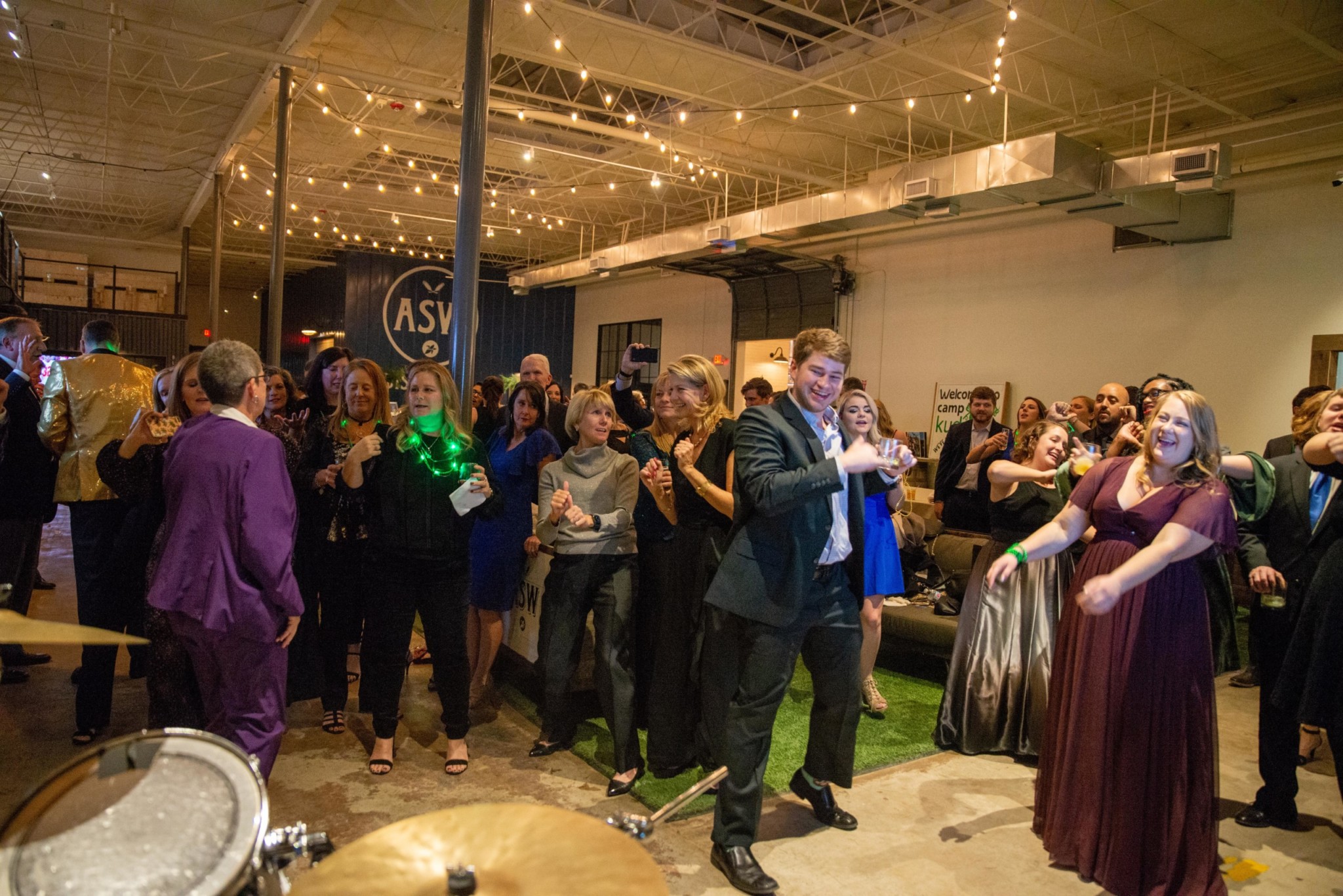 Event attendees dancing at a Camp Kudzu event