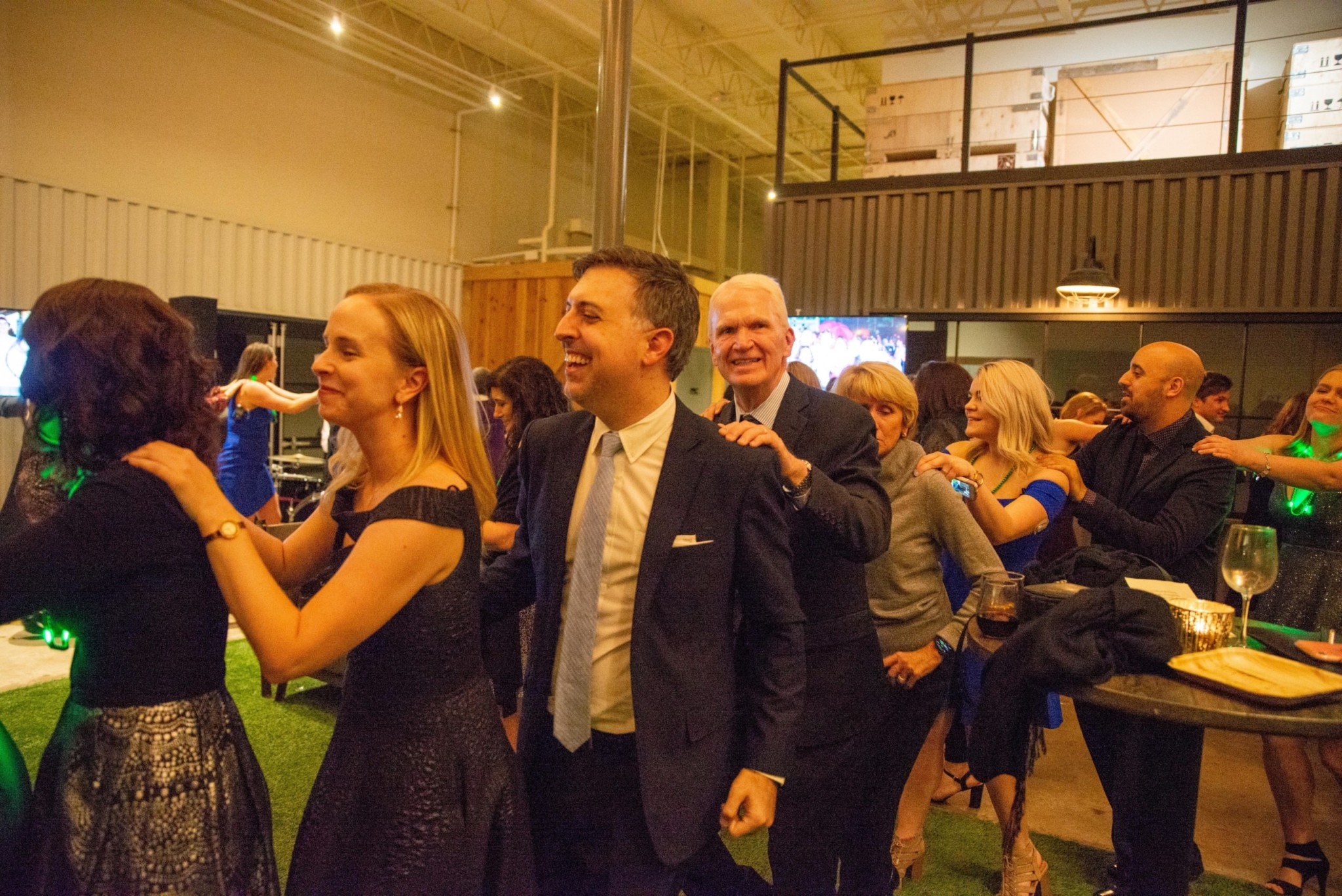 Event attendees dancing at a Camp Kudzu event